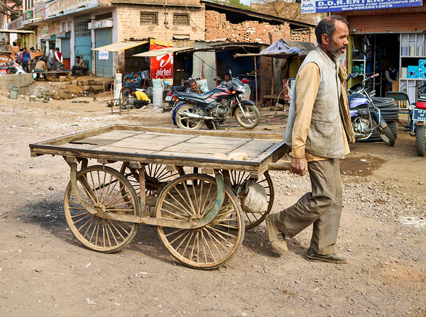 Man pulls an empty cart in Orchha Madhya Pradesh India Digital Download
