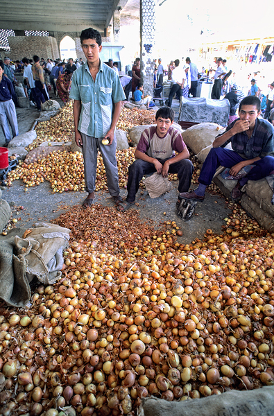 Young vendors sell onions in a market in Khiva Uzbekistan Digital Download