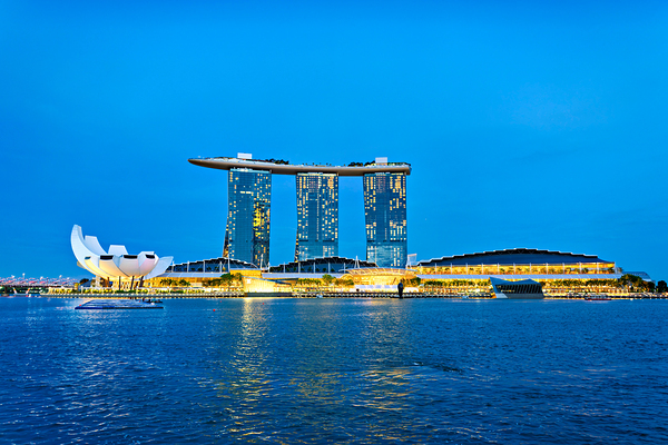 City skyline at sunset over Marina Bay with reflections on water Digital Download