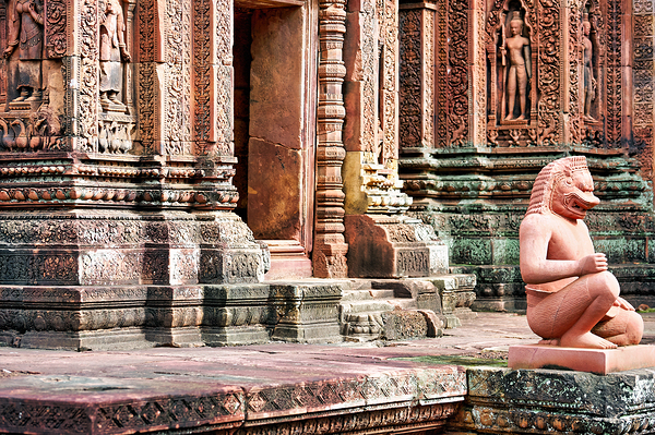 Ancient Cambodian temple with intricate carvings and guardian st Digital Download