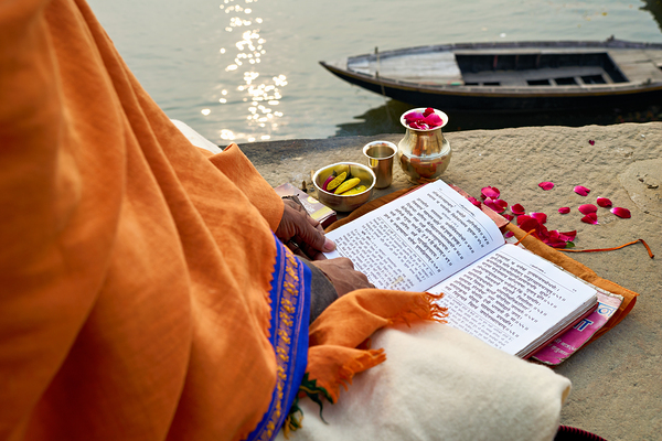 Praying by the ganges river in varanasi india Digital Download