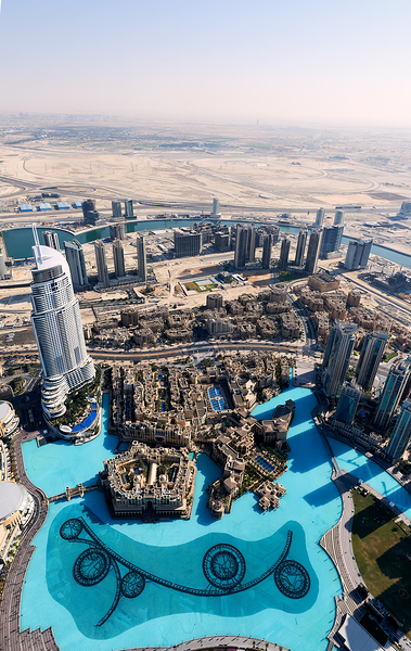Dubai cityscape shows buildings water and desert from above Digital Download