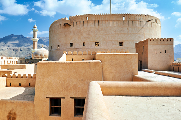 Visitors explore Nizwa Fort a historic site in Oman Digital Download