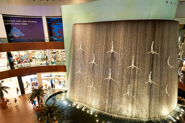 Indoor waterfall with diver sculptures in a mall in Dubai UAE Digital Download