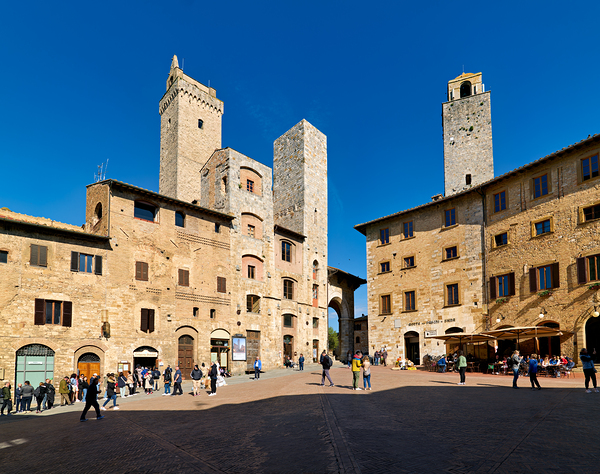 Visitors explore Piazza della Cisterna in San Gimignano Digital Download