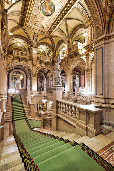 Ornate grand staircase with green carpet and classical statues. Digital Download