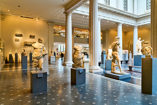 Visitors explore Greek and Roman galleries at the Met Digital Download
