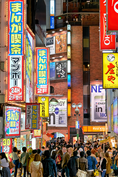 Nighttime crowd under neon lights in Shibuya district in Tokyo Digital Download