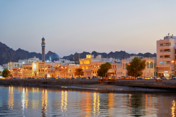 Sunset view of waterfront in Muscat Oman with city lights Digital Download
