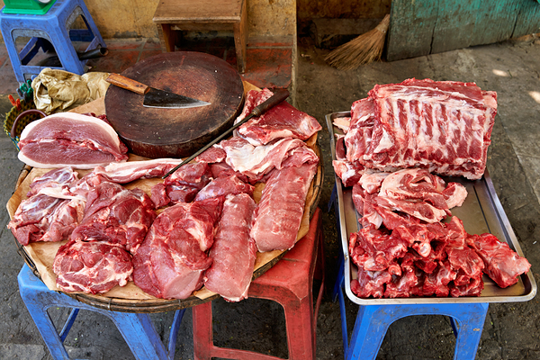 Fresh meat sold in Hanoi market during daytime Digital Download