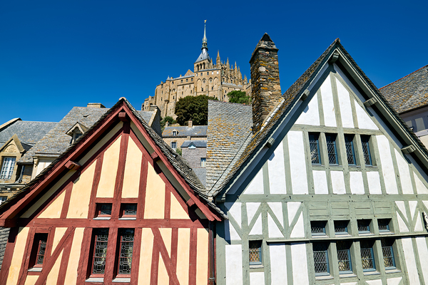 Visit Mont Saint Michel in Normandy France under clear blue sky Digital Download