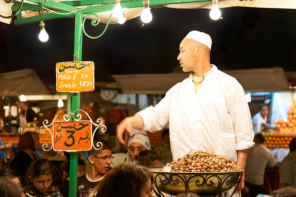 Snail dinner served at street vendors in Marrakech night market Digital Download