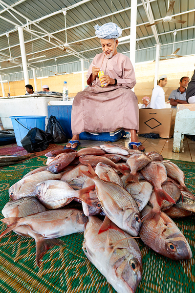 Man sells fresh fish at Muscat Oman fish market today Digital Download