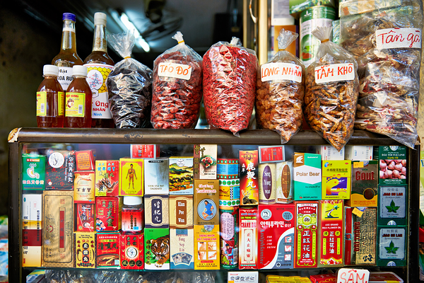 Market scene in Hanoi with spices and snacks on display Digital Download