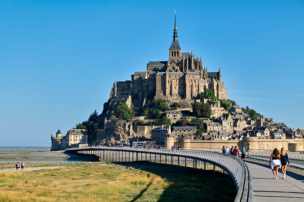 Tourists walking along the path to Mont Saint Michel in Normandy Digital Download