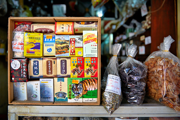 Variety of herbal products and packaging in Hanoi market Digital Download