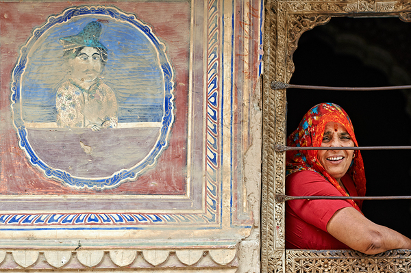 Woman smiles while looking out of a window in Mandawa Rajasthan Digital Download