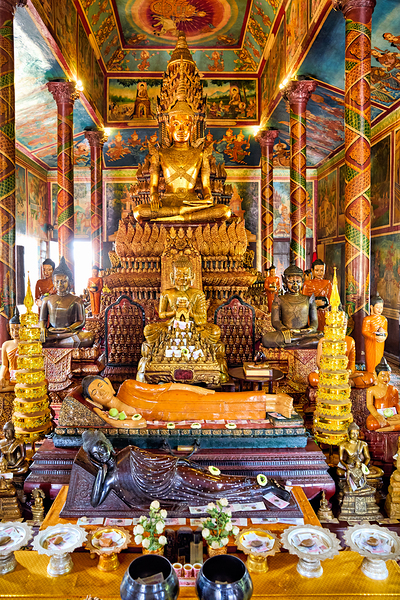Golden Buddha statues and offerings in an ornate temple. Digital Download