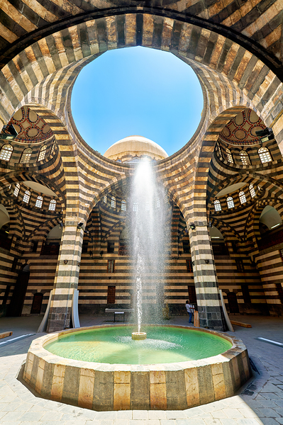 Visitors explore Khan Asad Pasha Caravanserai in Damascus Syri Digital Download