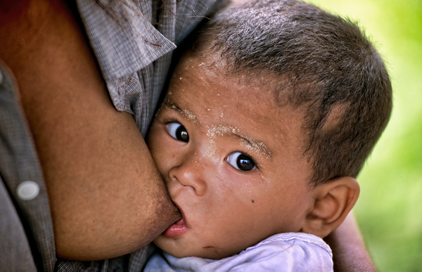 Feeding a baby in Myanmar during daytime hours Digital Download