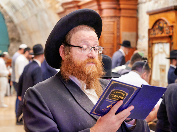 Orthodox Jews engaged in prayer at the Wailing Wall in Jerusalem Digital Download