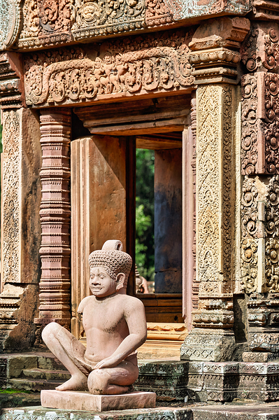Ancient Cambodian temple with intricate carvings and stone statu Digital Download