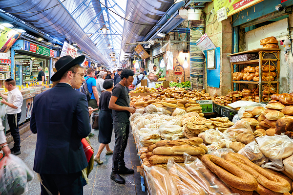 Visitors explore Mahane Yehuda Market in Jerusalem during daytim Digital Download