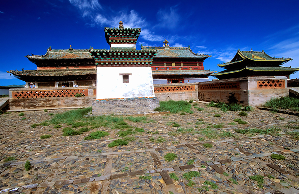 Erdene Zuu Monastery stands in Mongolia under a blue sky Digital Download