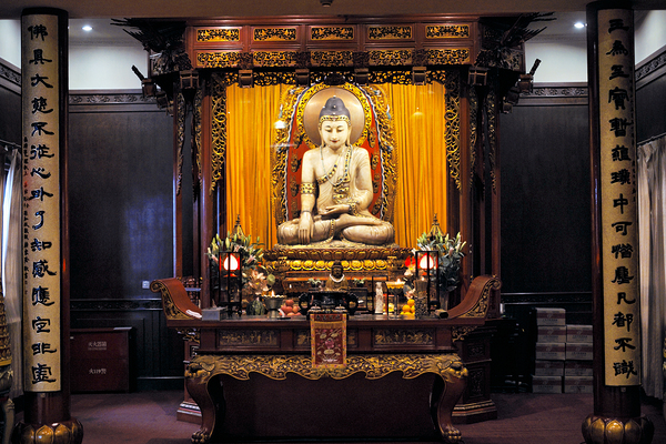 Buddha statue in ornate temple in Shanghai China Digital Download