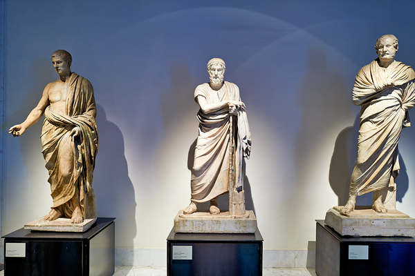 Statues of ancient philosophers displayed in museum setting Digital Download