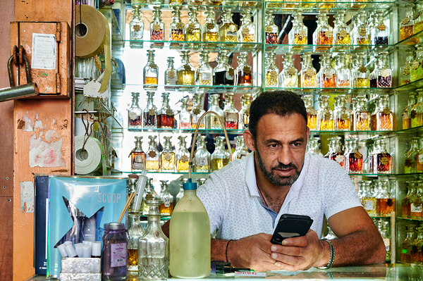 Man working in a perfumery in the old city of Jerusalem Digital Download