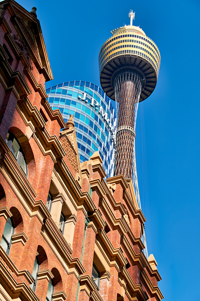 Sydney Tower and J.P. Morgan building against blue sky. Digital Download