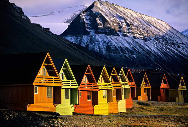 Colorful cabins in Longyearbyen Svalbard near snowy mountains Digital Download