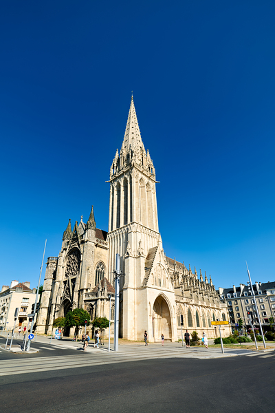 People walk near Saint Pierre church in Caen Normandy Digital Download