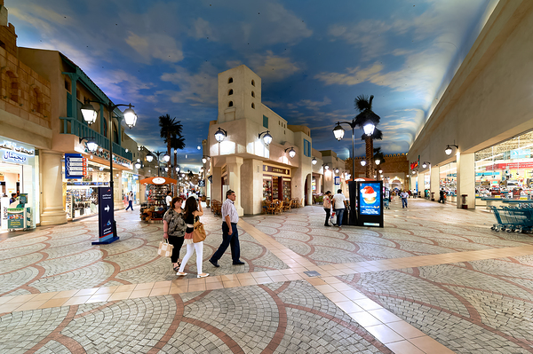 Shoppers stroll through a mall mimicking Dubais outdoor streets Digital Download