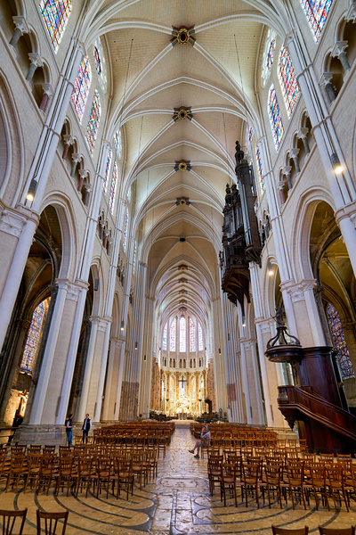 Chartres Cathedral inside with tall arches and wooden chairs Digital Download