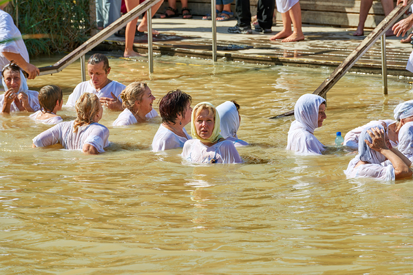 Visitors participate in baptism ceremony at Jordan River site Digital Download