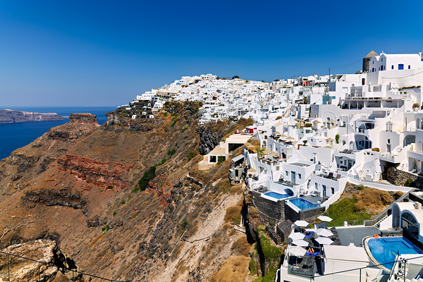 Santorini: White cliffside village blue sea clear sky. Digital Download