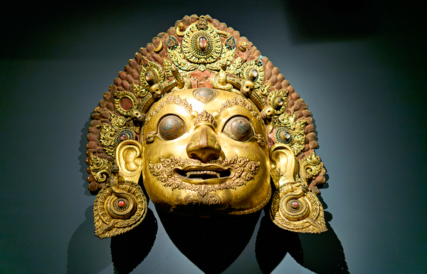 Golden face mask displayed at the Asian Art Gallery in Manhattan Digital Download
