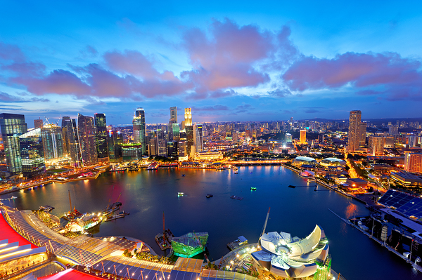 City lights shine over Marina Bay in Singapore at sunset Digital Download