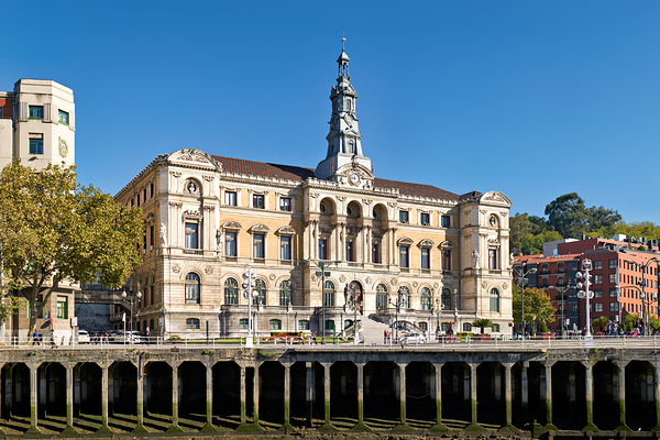 Building stands in Bilbao Spain next to water and trees Digital Download
