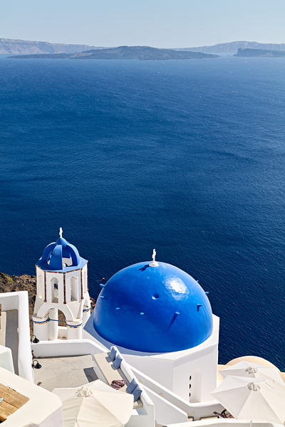 Santorinis blue domes and caldera view. Digital Download