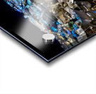 Illuminated cliffside town at night couple enjoying dinner. Acrylic print