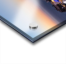 Santorinis Oia village glows at twilight by the sea. Acrylic print