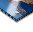 Santorinis iconic white buildings and blue domes overlooking th Acrylic print