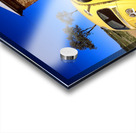 A painted yellow Beetle outside a rural stone gallery. Acrylic print