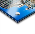 Modern curved building with balconies and city skyline. Acrylic print