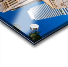 Historic church stands tall next to modern skyscrapers. Acrylic print