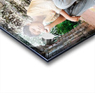 Young person sits on ancient temple ruins. Acrylic print