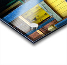 Smiling young monk in red robes at colorful traditional building Acrylic print